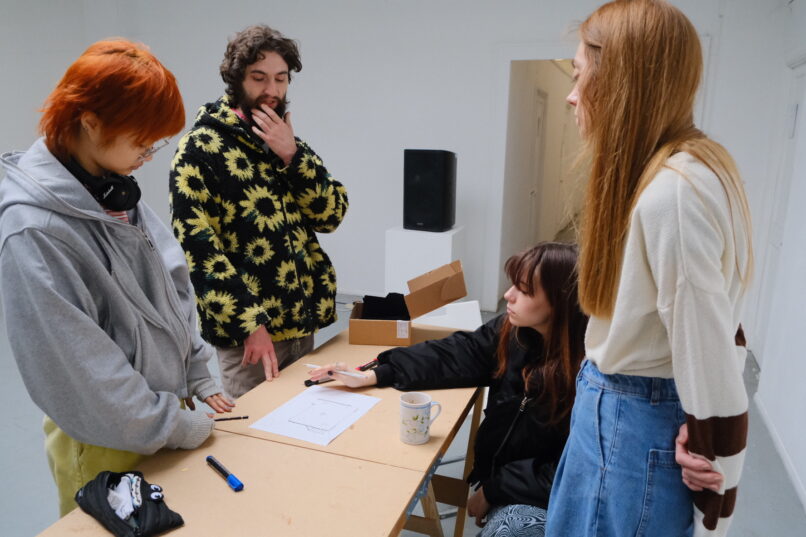 threadsafe members working on the concept of the exhibition